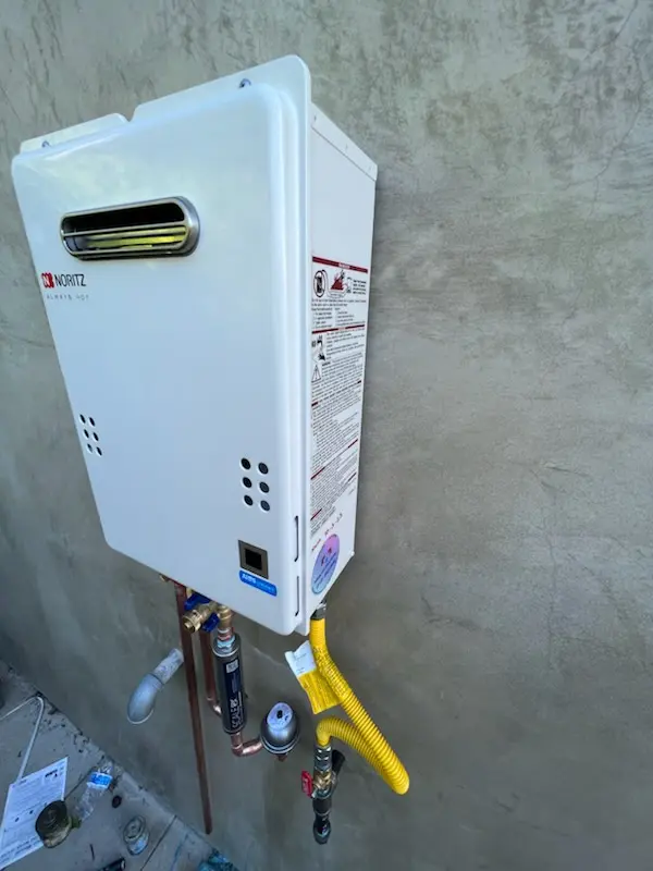 Tankless water heater installation for Lakewood Mutual homes
